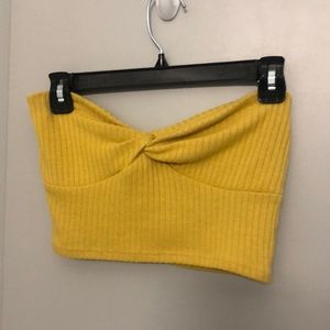 Twist front tube top